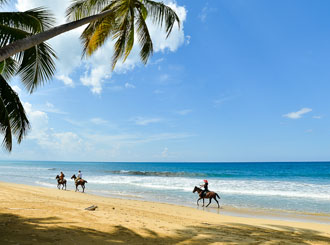 Balade à cheval sur la Playa Coson